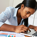**Prompt 1: Financial Clarity and Preparation**
    A focused, calm individual (diverse ethnicity, gender-neutral) sits at a well-lit desk, surrounded by financial documents, a laptop displaying charts, and possibly a calculator or a notepad. They are meticulously analyzing numbers and data, perhaps with a pen in hand, creating a sense of methodical planning and detailed assessment. The atmosphere is clear, organized, and conveys a feeling of being in control and prepared, not overwhelmed by the situation. The background is simple and uncluttered, emphasizing the person's concentration.